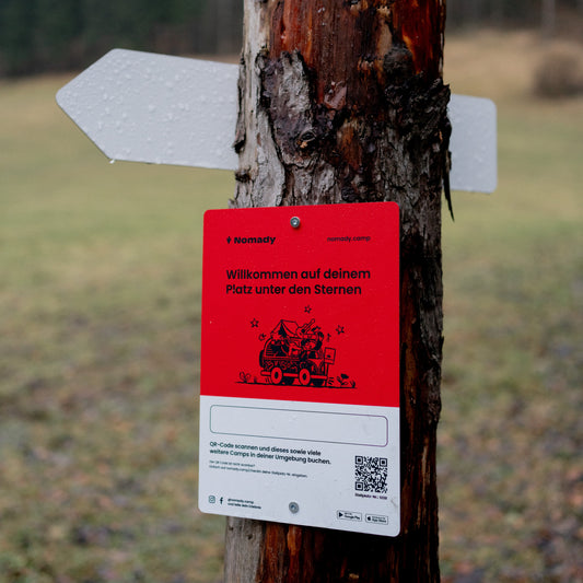Nomady Stellplatz Schild